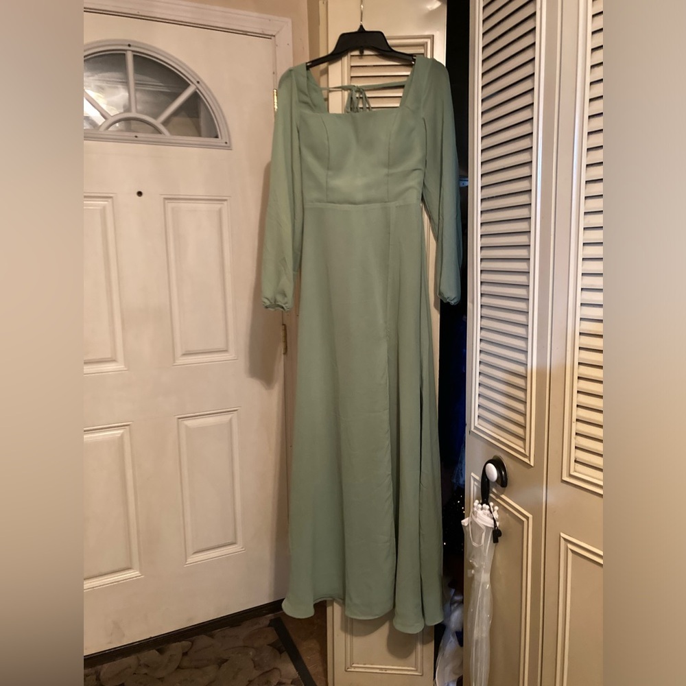New without tags floor length long Sleeve gown, light, green chiffon, size 8.